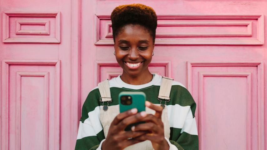 woman typing on a smartphone
